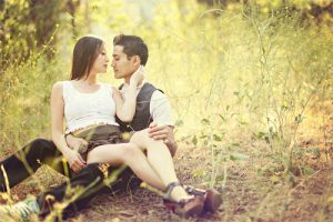 17 grass ground sitting couple engagement photography